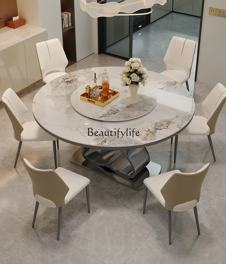 

Italian light luxury small apartment rock slab dining table high sense 2024 new dining table