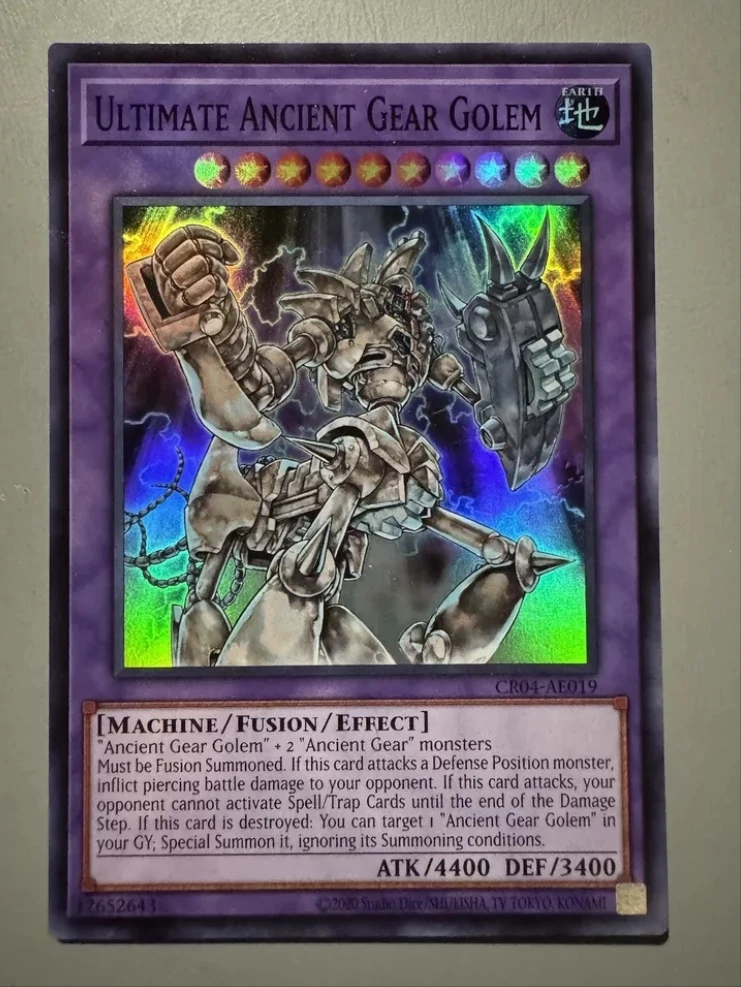 

Yugioh KONAMI Duel Monsters CR04-AE019 Ultimate Ancient Gear Golem Super Rare Asian English Collection Mint Card