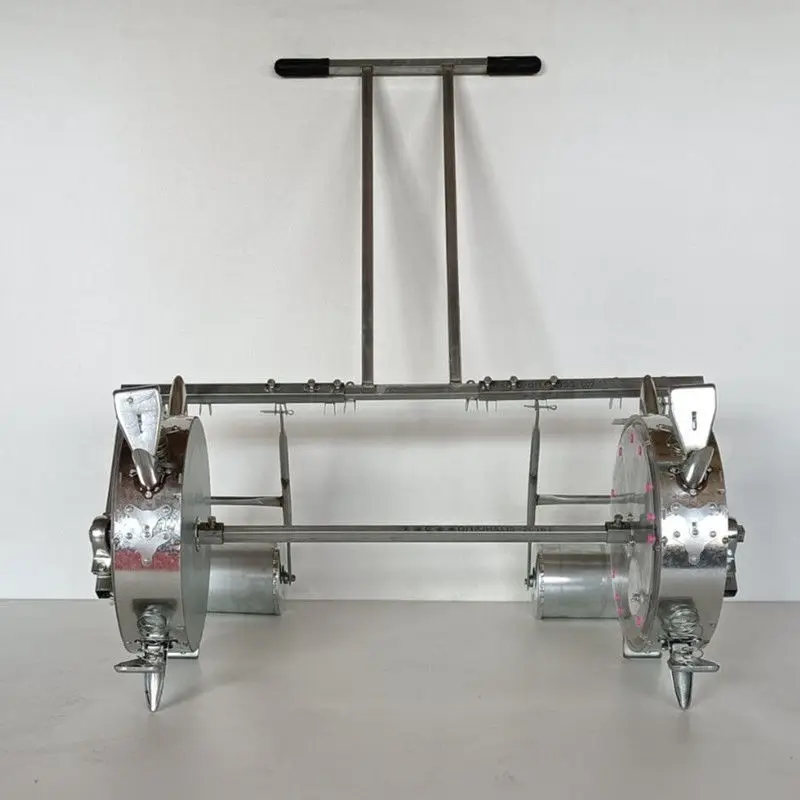 Two rows of manual push-on-demand machine, fertilization and sowing, two rows of roller seeding machine