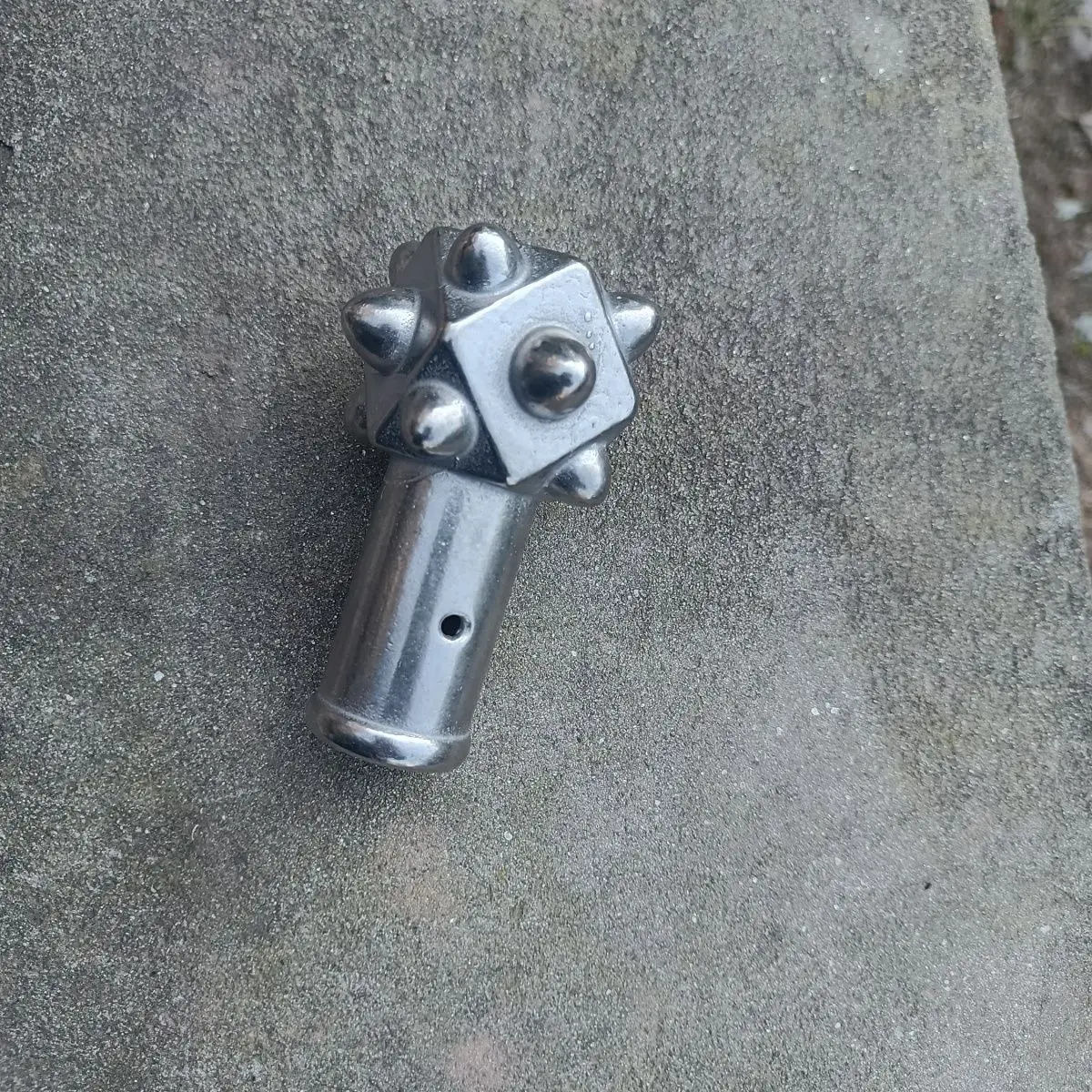 Bone Hammer Head, The Casing Is 5 Cm Long,  Diameter of  Hammer Head Is about 7 Cm,  Weight Is 550 Grams