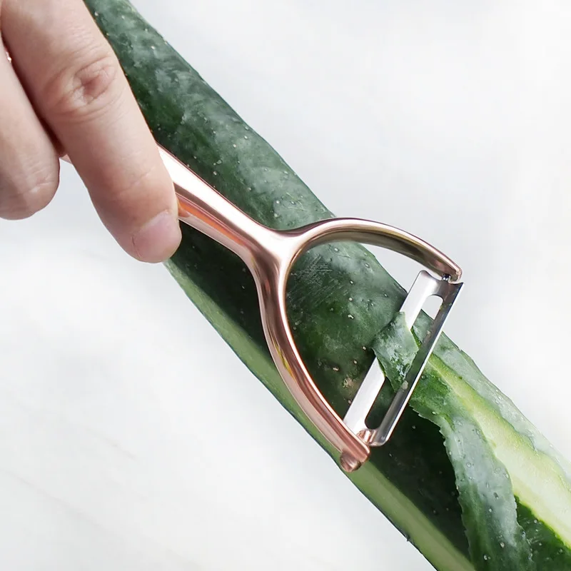 

Zinc alloy electroplated rose gold melon planer multi-functional peeling and paring knife melon fruit potato planer
