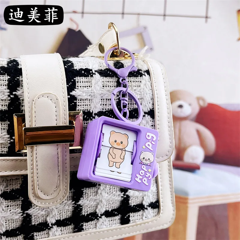 Funny Book Flip Animation Machine Keychain Pendant Creative and Refined Backpack Gift