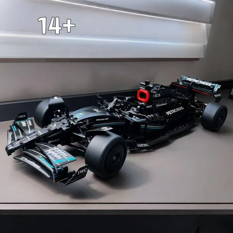 

В наличии 2025 подарки для вечеринок и 42171 представления супер гоночный автомобиль кирпичная модель автомобиля DIY транспортные средства подарки 1642 шт.