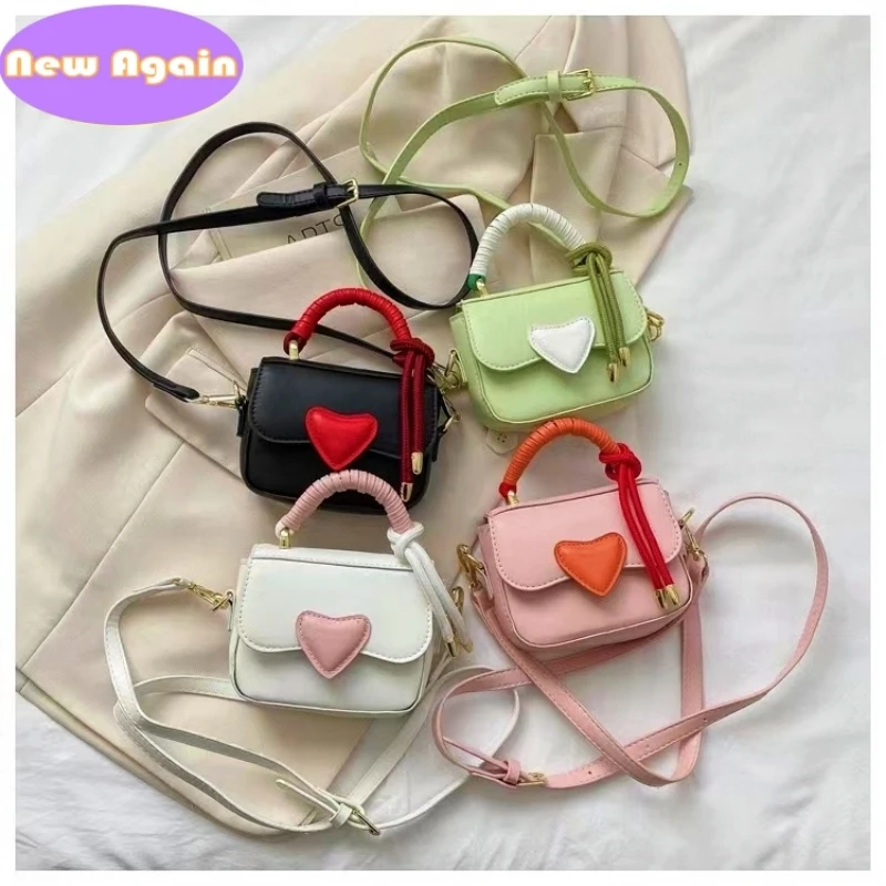 

Children's mini handbags Girls princess totes Baby kids messenger Bags Child heart design purses Toddlers shoulder bags NA011