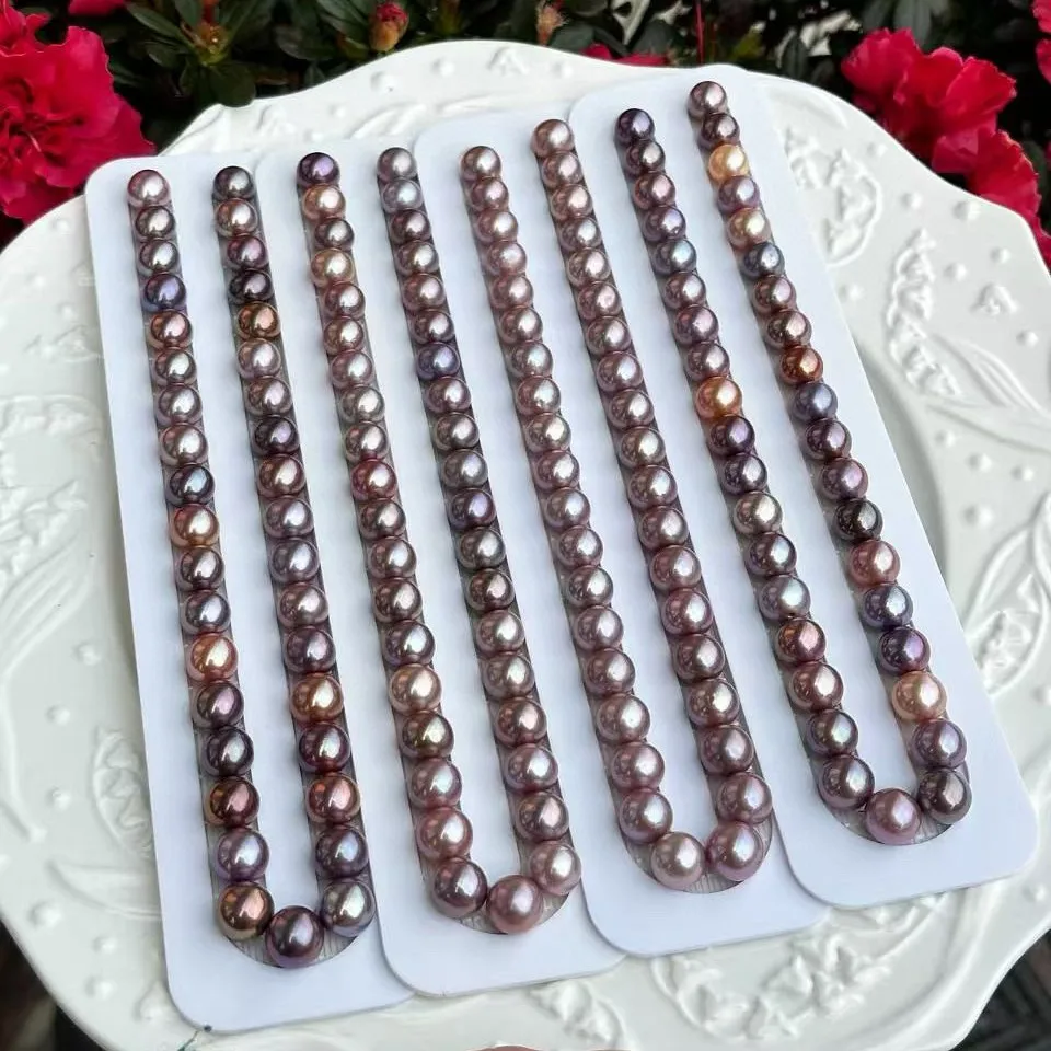 

Ожерелье из натурального пресноводного жемчуга Эдисона смешанного цвета 10-11 мм, фиолетовая гладкая кожа, высокий блеск, почти круглые небольшие вкусы