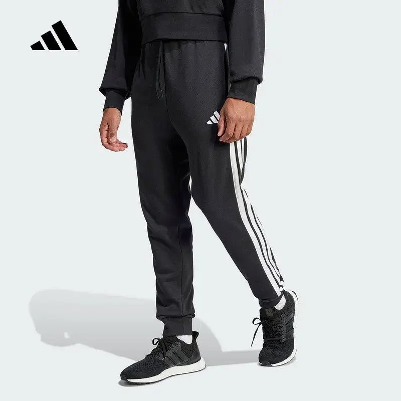 adidas-pantalon-unisexe-pour-homme-et-femme-ideal-pour-l’automne-et-l’hiver-en-tissu-fin-taille-haute-coupe-ajustee-avec-poches-laterales-a-fermeture-eclair-pour-un-usage-quotidien-modele-jd1881