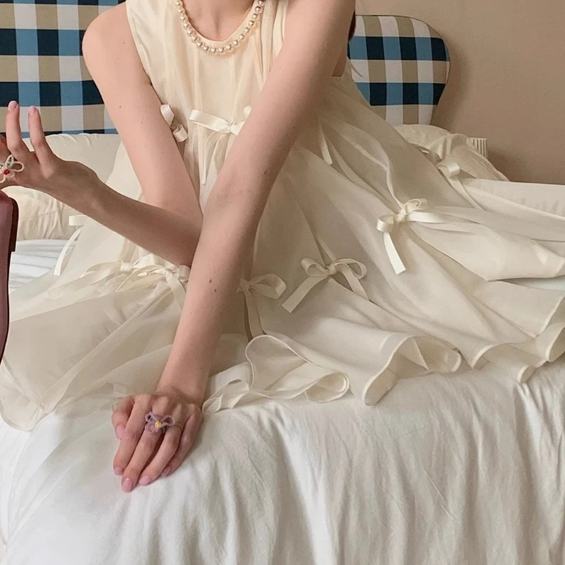 ชุดเดรสโบว์ดีไซน์หวานๆ 2025 ฤดูร้อนเสื้อยืดแขนกุดปุยหวานน่ารัก