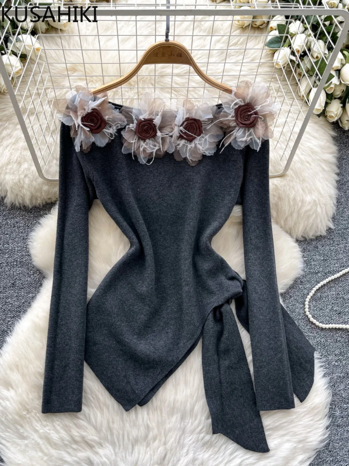 KUSAHIKI Three Dimensional Flower Shoulder Long Sleeved Knitted Sweater with Women's Straps Slim Fit Split Irregular Top