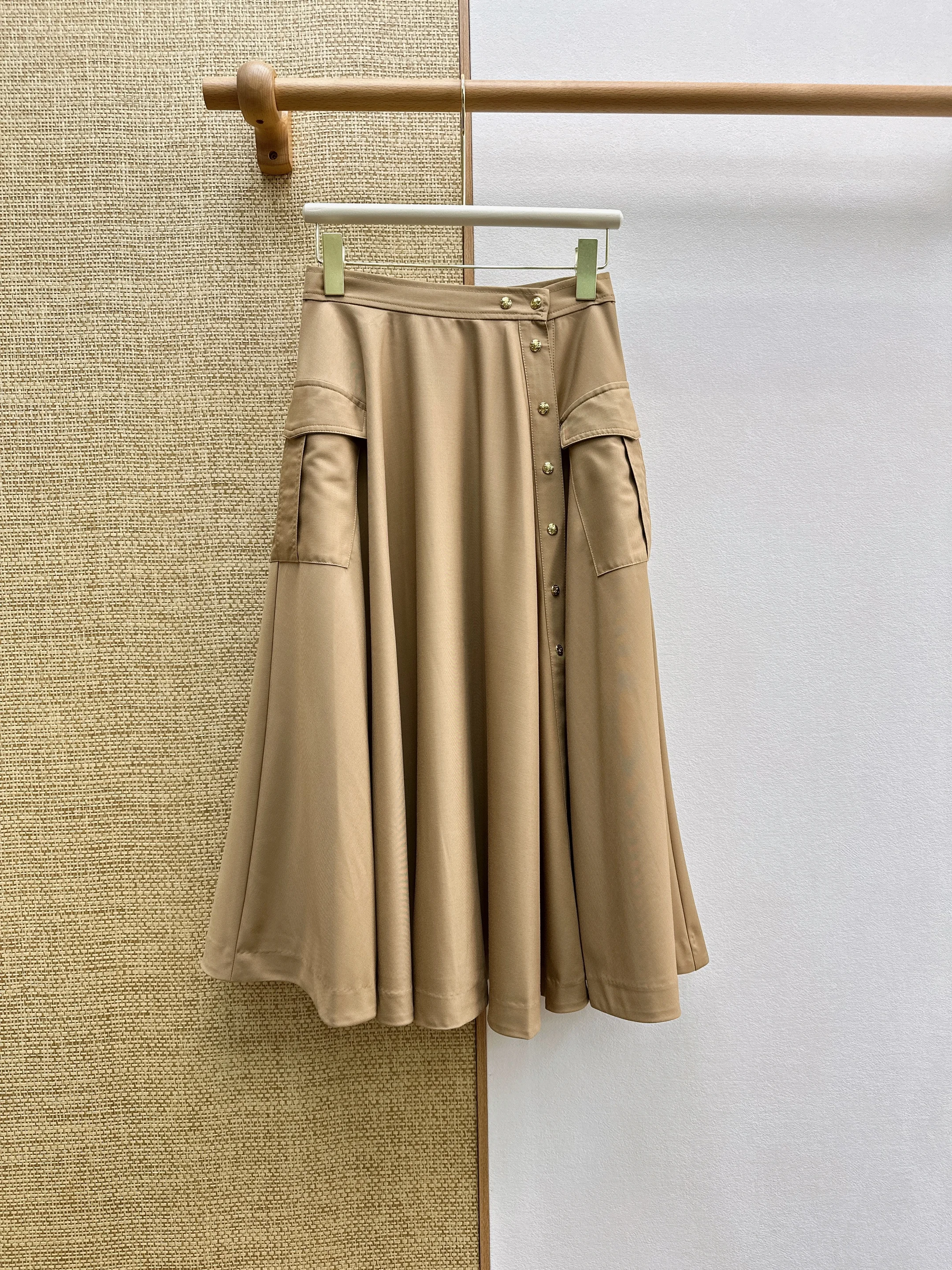 2026 spring/summer new workwear with wind side buckle mid length skirt