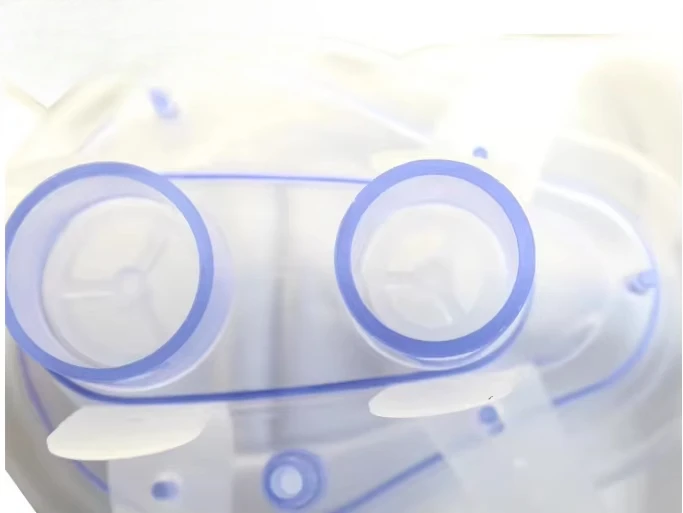 Disposable twin port mask with peep valve