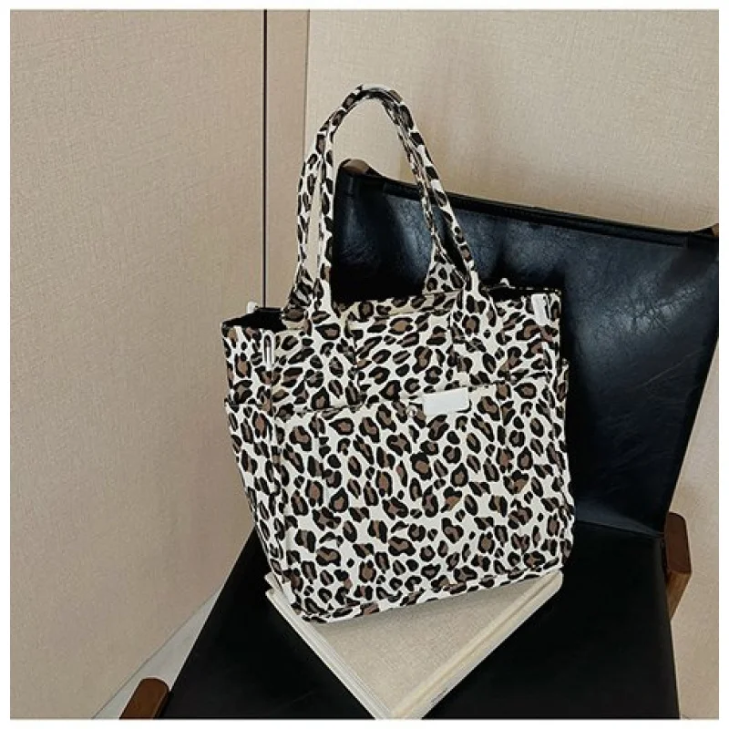 

Роскошная брендовая женская сумка с фирменным узором, модные прогулки