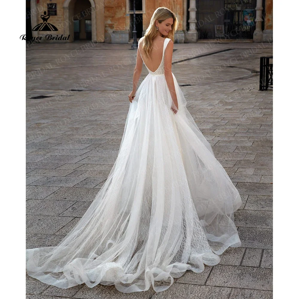 فستان زفاف Roycebridal Beach على شكل حرف a من التل اللامع اللامع مثير بياقة على شكل V وأكمام قصيرة سويب تريان 2025 مخصص فيستدو دي نويفا