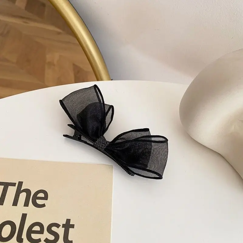 2026 Neu eingetroffen: 2er-Set elegante schwarze Haarspangen mit Schleife und Entenschnabel-Clip, modische seitliche Haarnadeln für Damen, ideal für den Alltag und Partys – Detail 2