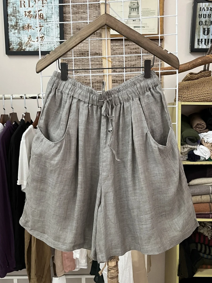 กางเกงขาสั้นผ้าฝ้ายลินินทรงหลวมเอวยางยืดสำหรับผู้หญิงไซส์ใหญ่ สไตล์ลำลอง ใส่สบาย เหมาะสำหรับฤดูร้อน