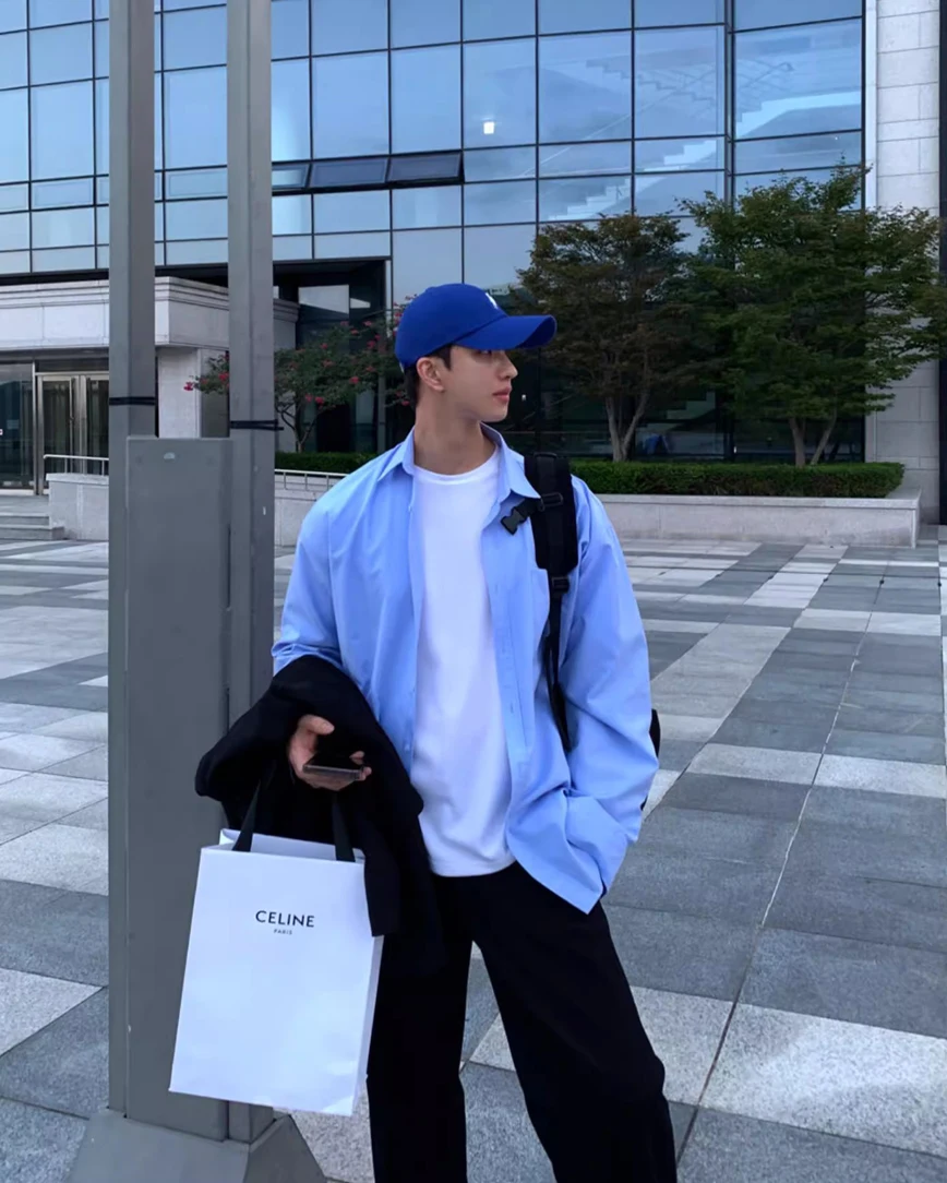 Americano retro azul masculino irt solto longo sve casual workwear proteção solar cor pura versátil na moda botão-up