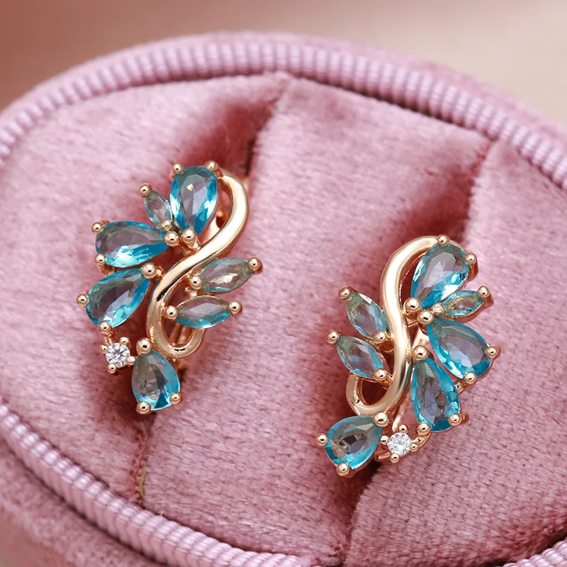 New Personality Bright Blue Zircon Earrings 585 Rose Gold Hollow Charm Curve Symmetrical Buckle Earrings Party Unusual Jewelry