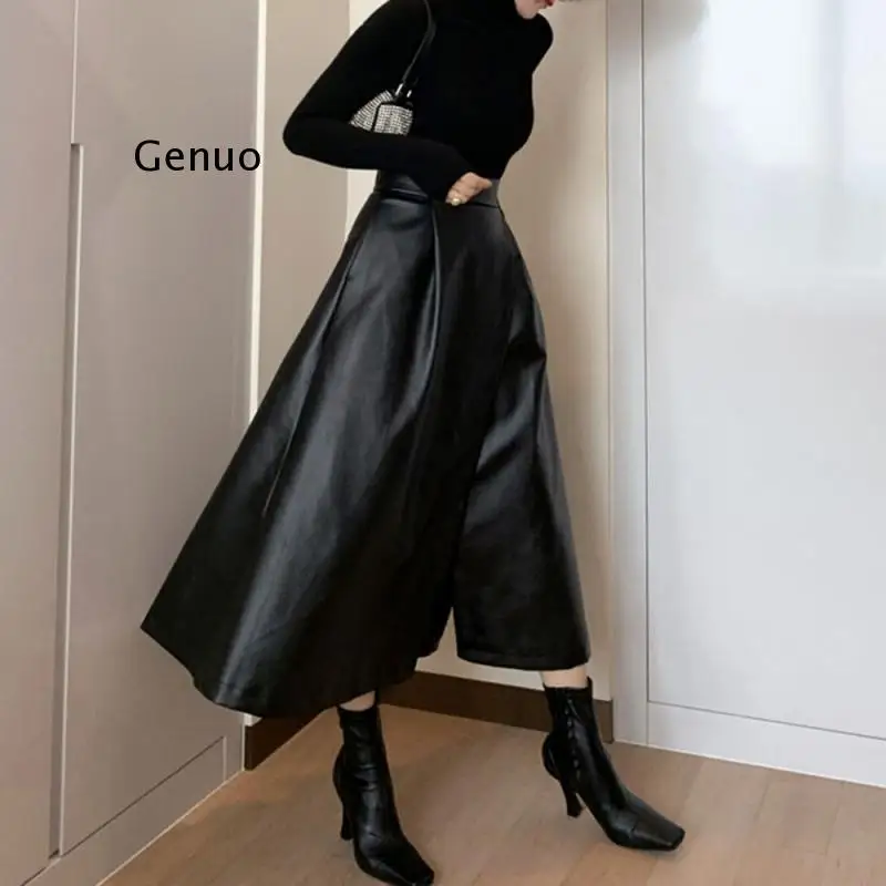 

2022 Fashion Street Wear Women Solid Black Pu Leather Skirts Spring A-Line Swing High Waist Split Skirt Office Lady Punk Style