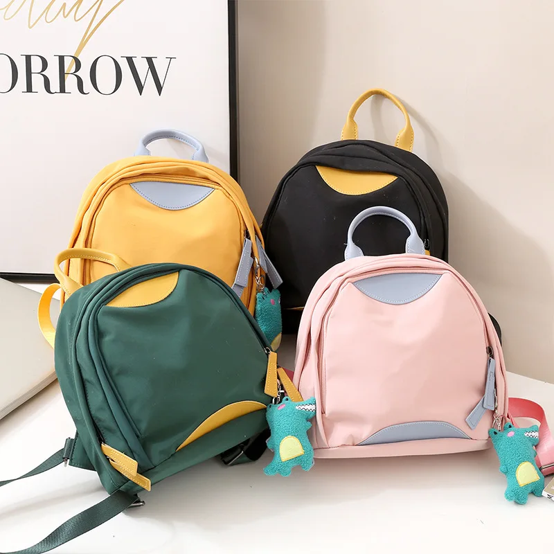 Waterproof Oxford fabric backpack with contrasting colors, large capacity and multiple pockets, wear-resistant student schoolbag