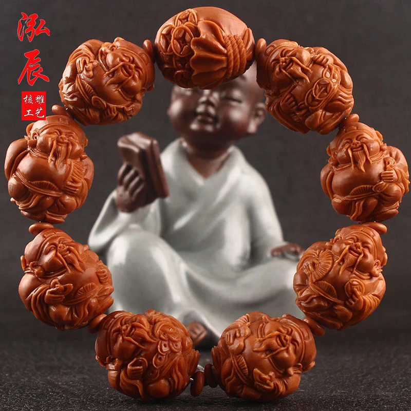 

Eight Wealth Deities Olive Kernel Bracelet, hand-carved from highly sought-after old material, featuring short, round, large bea