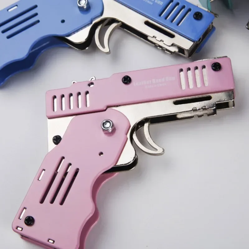 1pcs Folding Rubber Band Gun, Children\'s Toy Metal Six-Shot Boy Keychain Pendant Tools