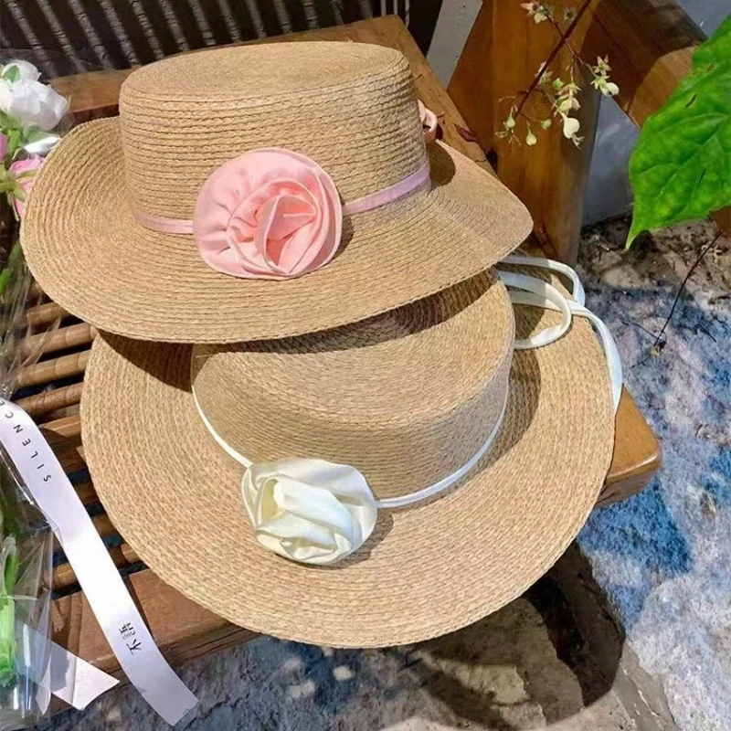 

French little fragrant camellia straw hat women's summer beach holiday beach hat Hepburn style bow flat top hat