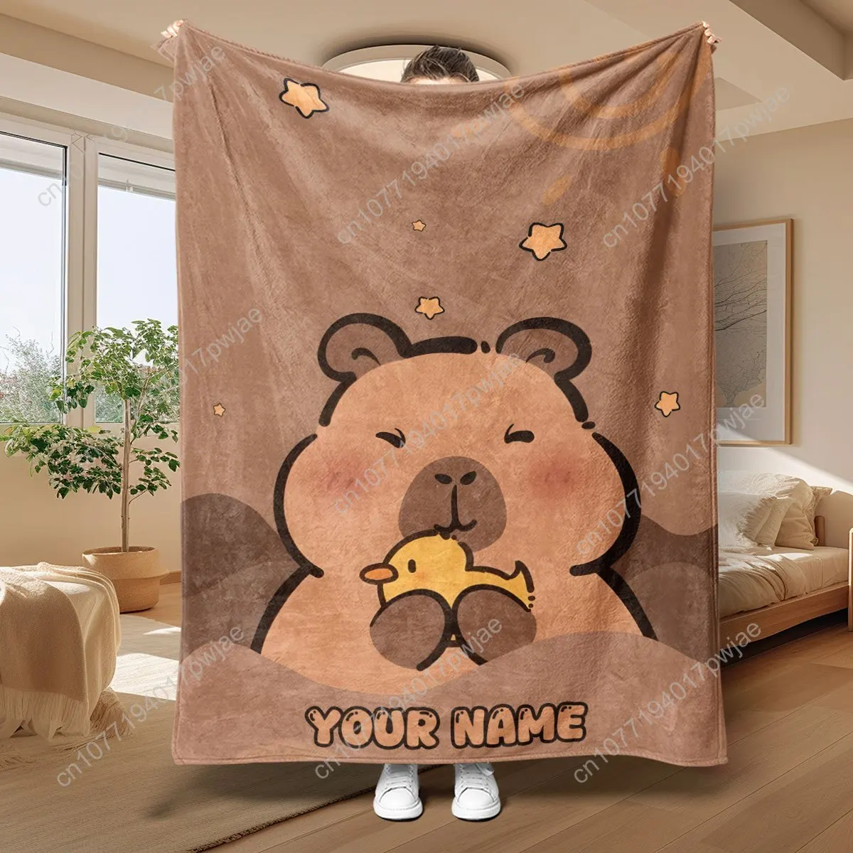 

A Warm And Cozy Flannel Printed Blanket. Customizable Text Option. Adorable Cartoon Capybara Pattern. Perfect for Sofas, Beds, O