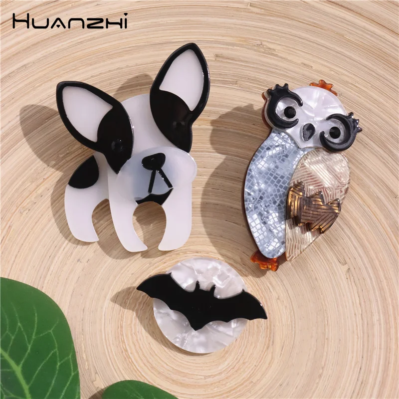 Huanzhi-女性と男性のためのアクリル動物のブローチ,戦闘,漫画のファッション,クリエイティブなデザイン,日常のアクセサリー,白,黒,2023