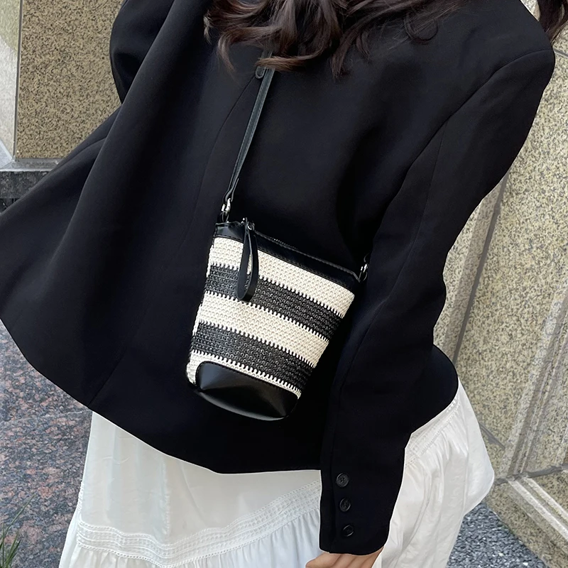 スタイリッシュな高級レザーバッグ、通勤機能とヴィンテージの魅力を兼ね備え、普段使いに最適なマザーズバッグ