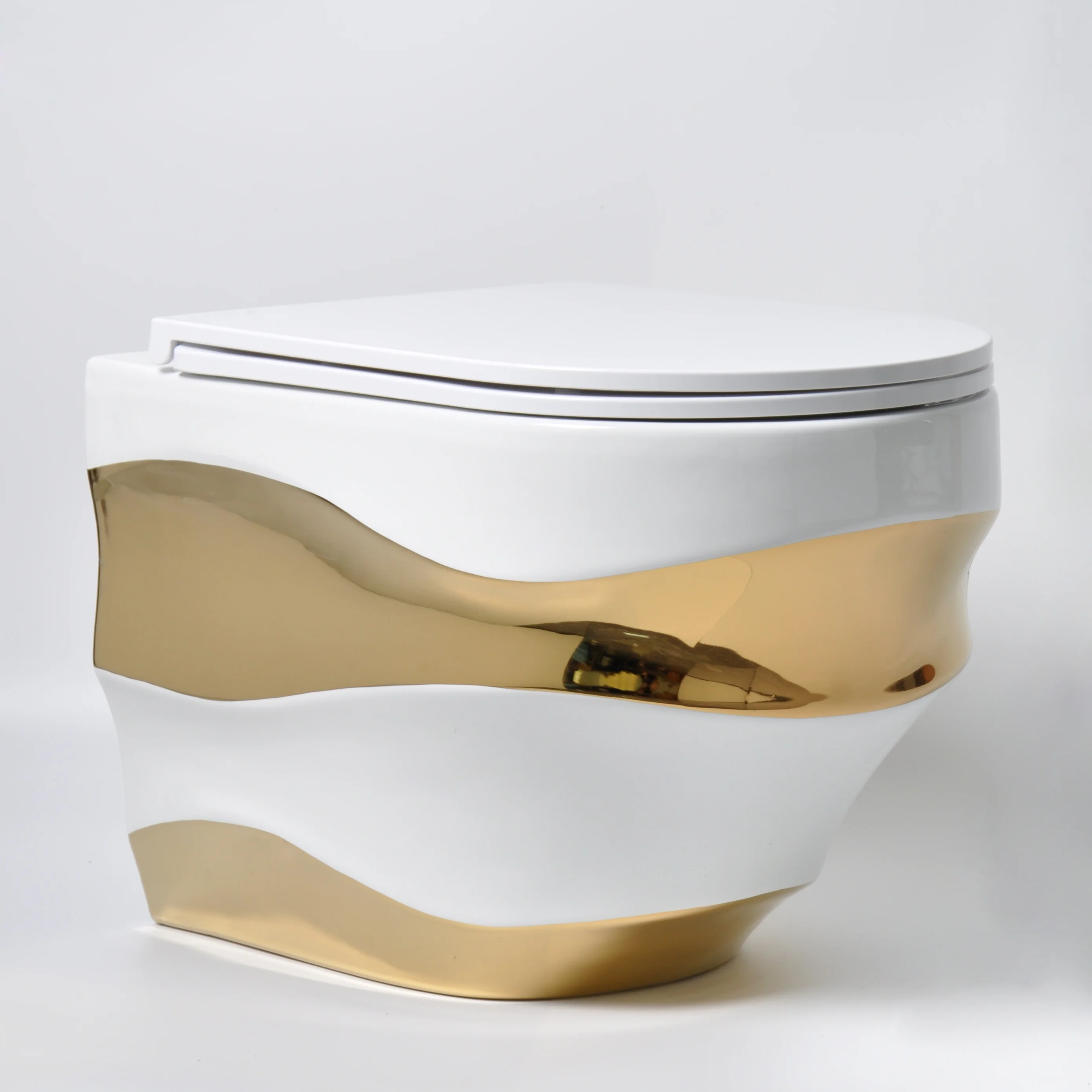

Special Wave Shaped Design Luxury Gold Electroplating Toilet One Piece Bathroom Wall Hung Toilet With Buffer Cover
