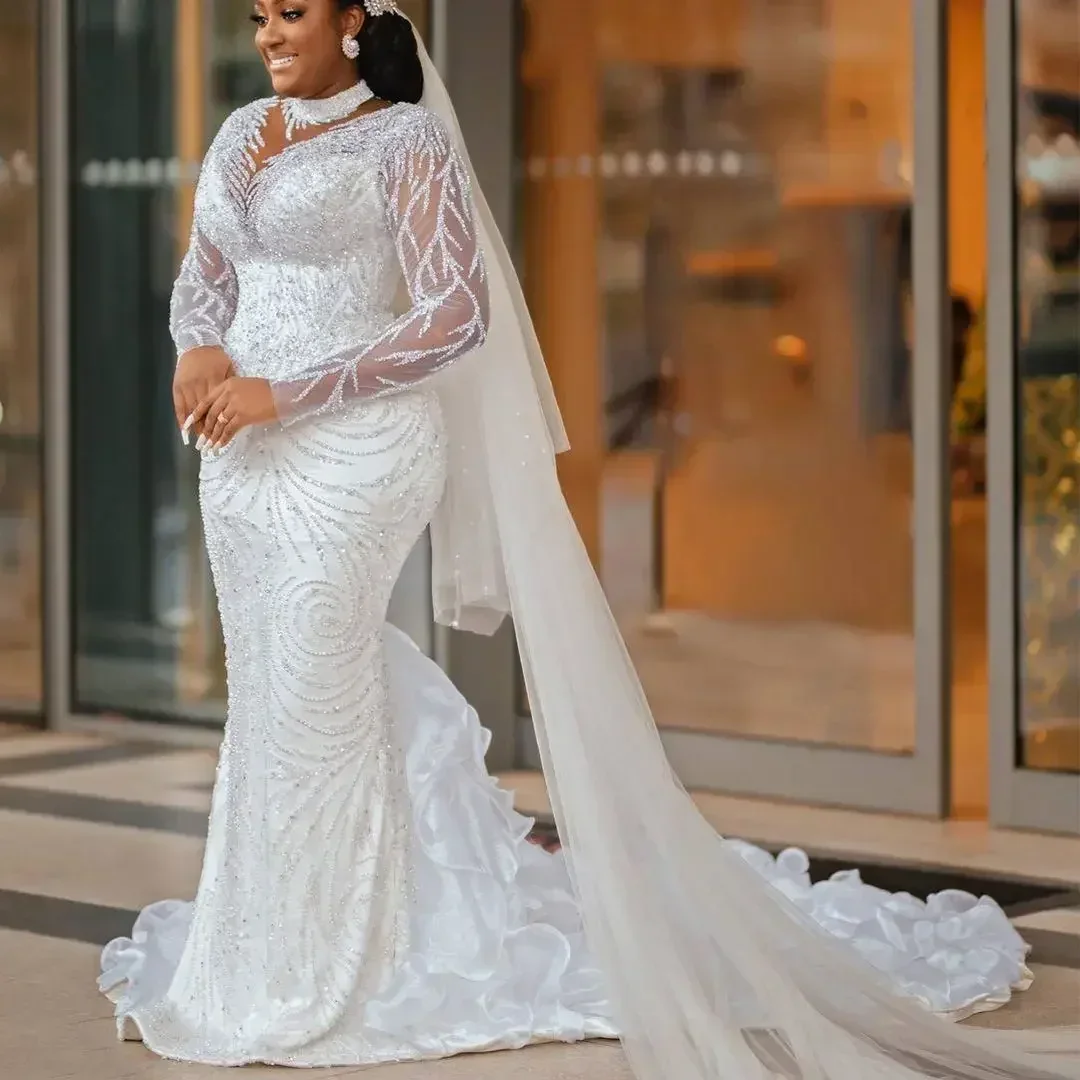 

Индивидуальные свадебные платья для африканских женщин с роскошной вышивкой бисером, с иллюзорными длинными рукавами, высоким воротом, силуэт «русалка»