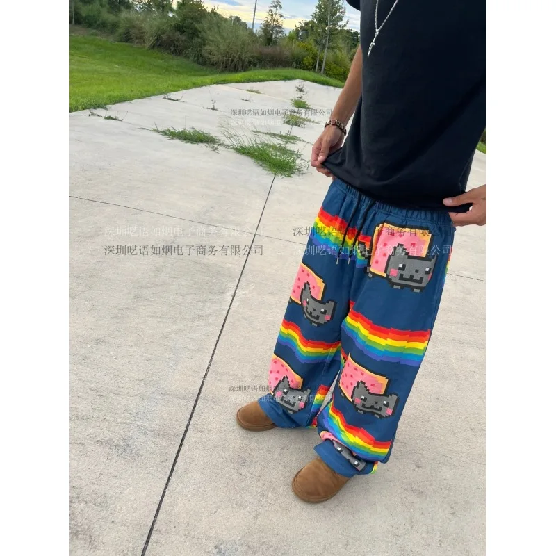 نيان كات بكسل طباعة السراويل الرجال 2025 جديد المتضخم فضفاض الشارع الشهير قوس قزح نمط بناطيل كاجوال Harajuku موضة مريحة