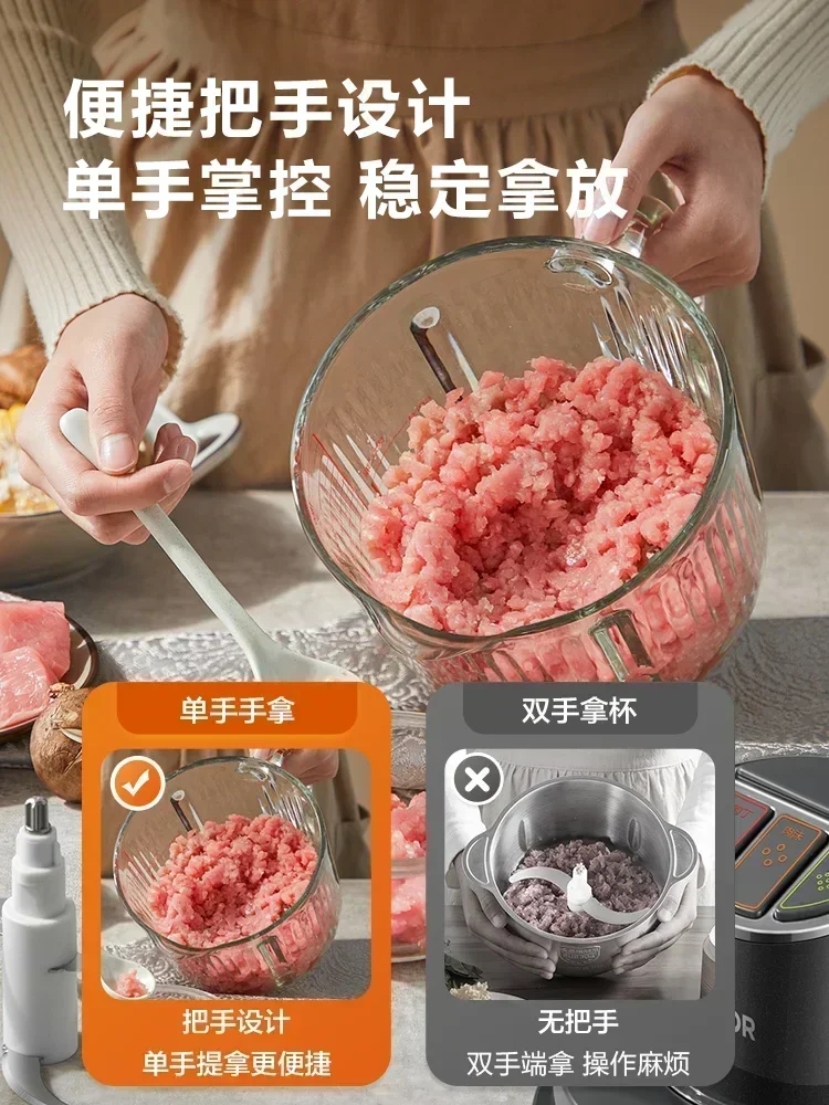 Household electric meat grinder. Small, automatic, multi-function. For minced meat, vegetables. Food supplement machine.