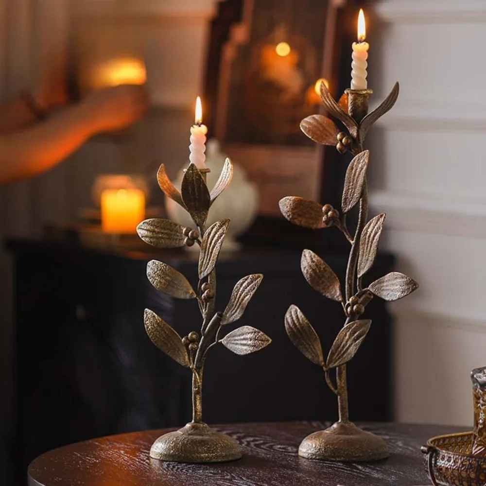 

Decorative Wrought Iron Candle Holder with Plant and Flower Design, Suitable for Entryway Countertops.