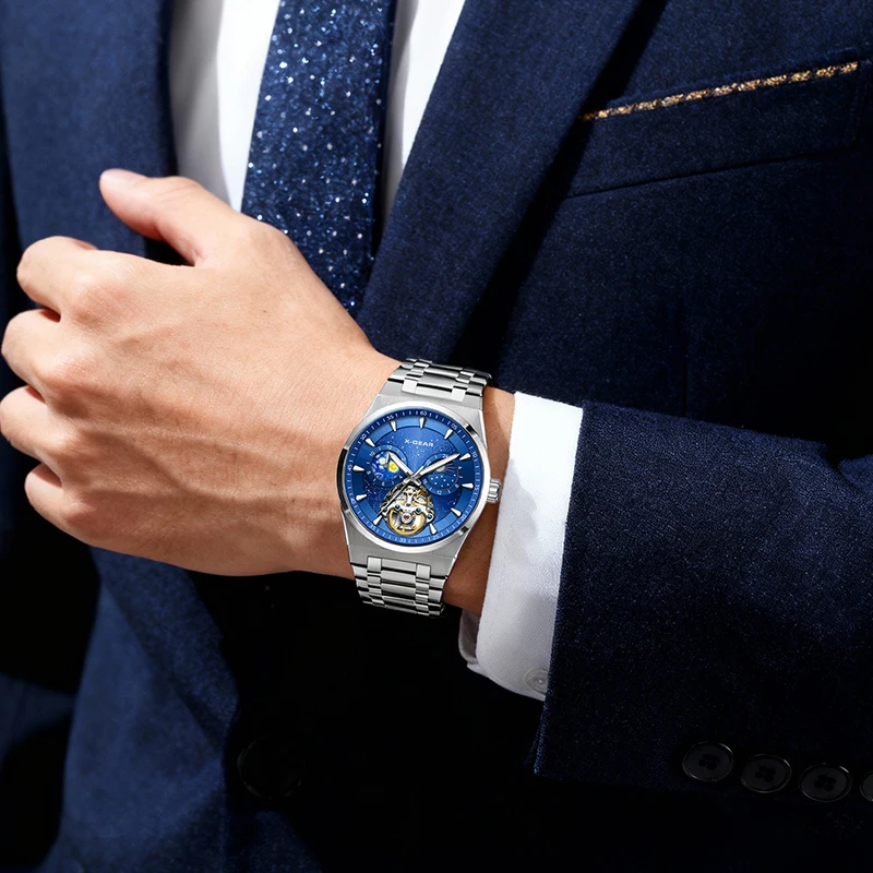 ساعة X-GEAR للرجال بحركة ميكانيكية وسوار من الفولاذ المقاوم للصدأ وهيكل عظمي ممتاز ومضيئة ومقاومة للماء