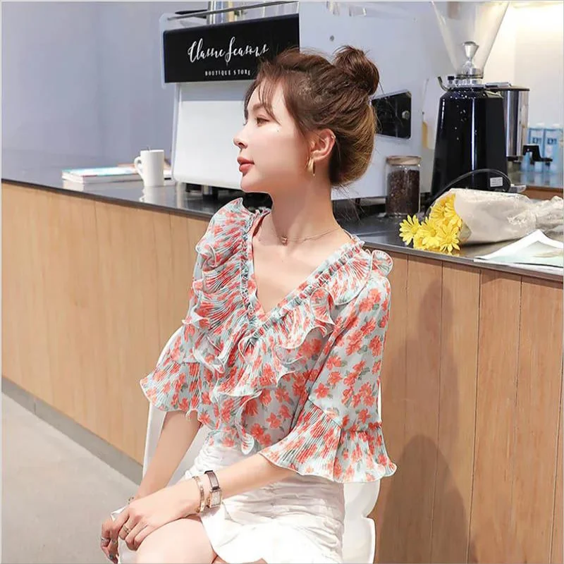 พิมพ์ Ruffles ดอกไม้ Flare แขนเสื้อชีฟองเสื้อผ้าผู้หญิงฤดูร้อนใหม่ขนาดใหญ่เสื้อลําลองเสื้อ Commuter