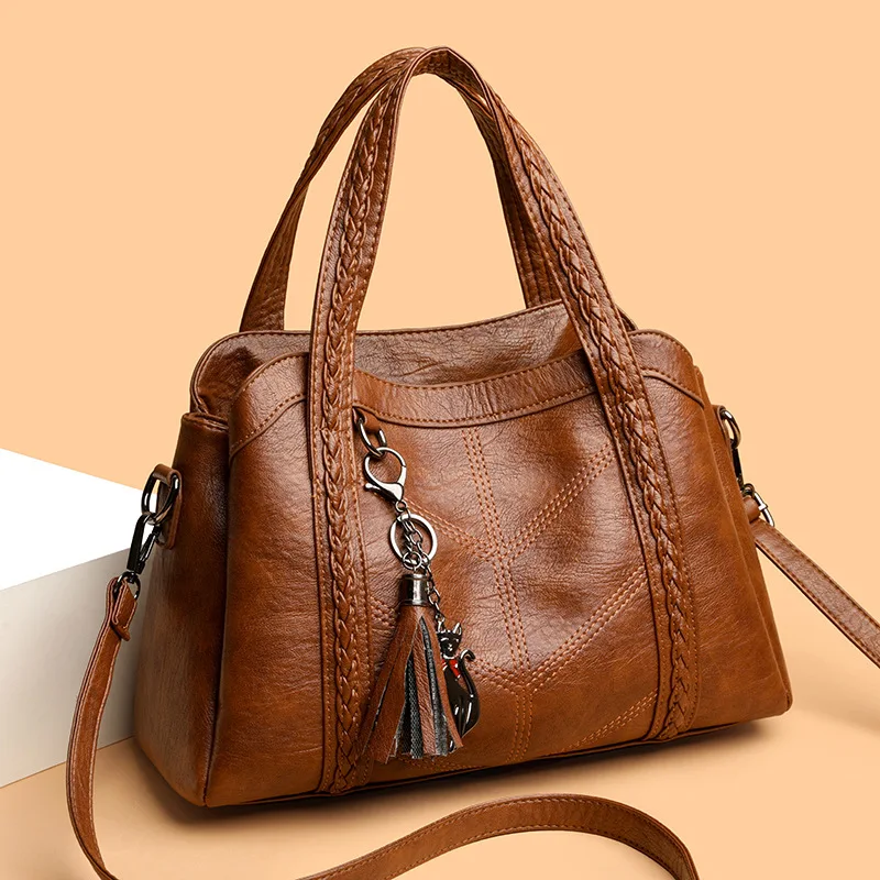 Portable large bag, women's leather new tote bag, large-capacity women's bag, versatile commuter bag, shoulder messenger bag.