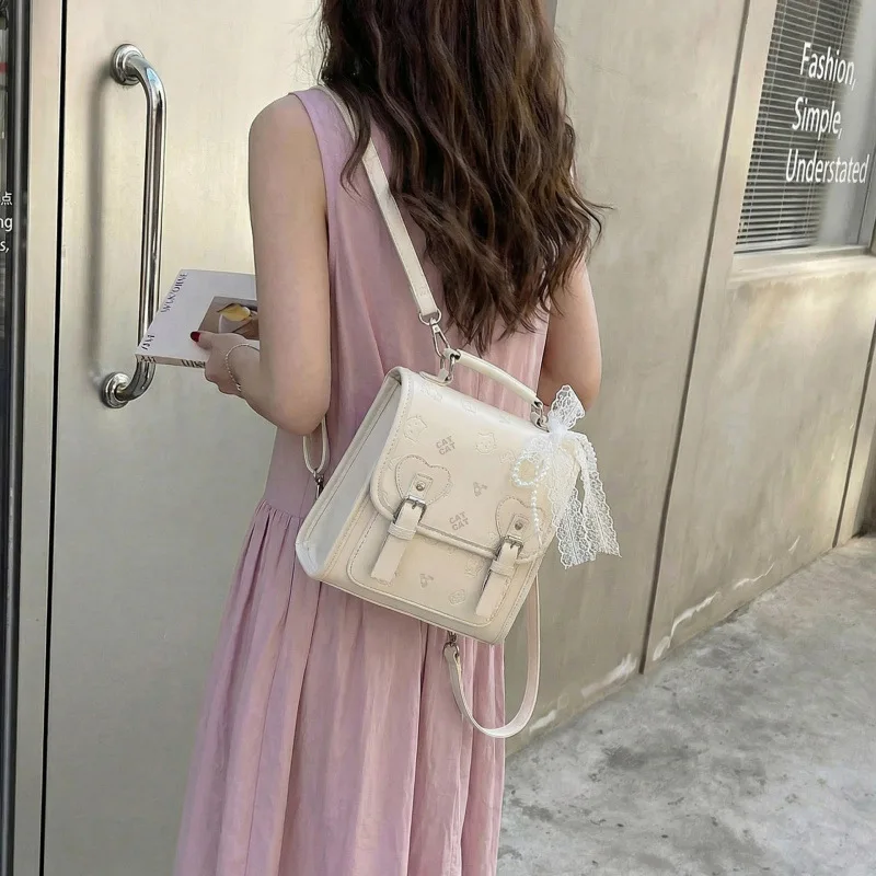 

Premium sense niche embossed bag women's 2026 new exquisite mini versatile backpack travel small schoolbag