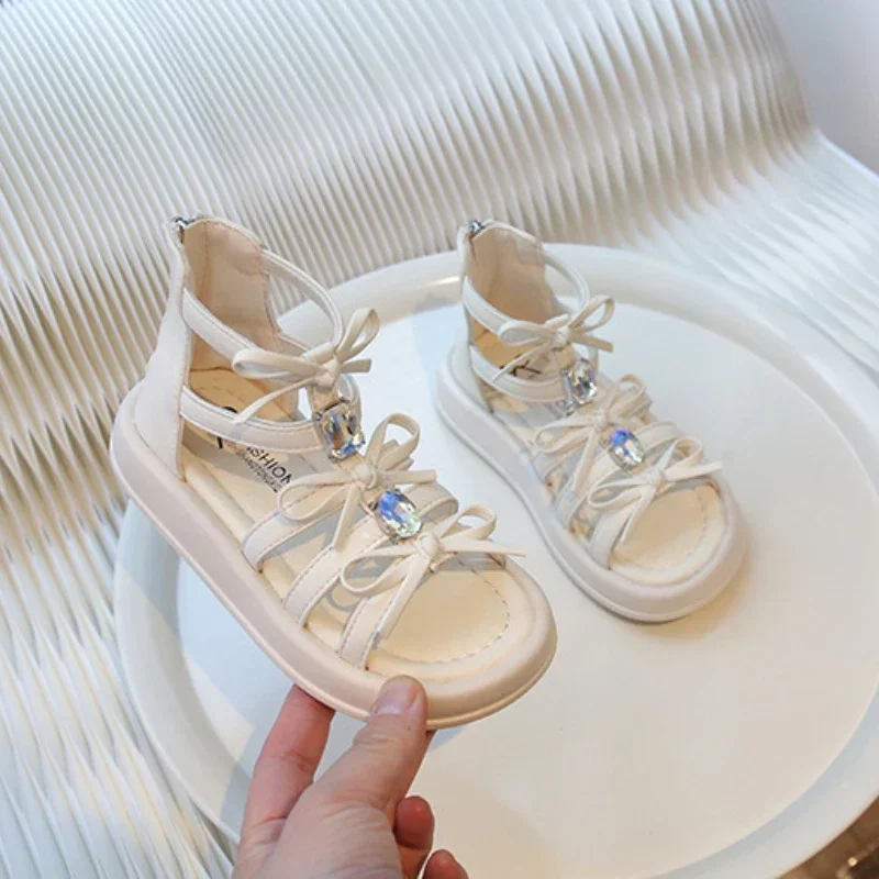 

Детские пляжные сандалии с открытым носком и милым бантом, сандалии для девочек, новая летняя детская модная повседневная обувь с вырезами, универсальная универсальная обувь принцессы