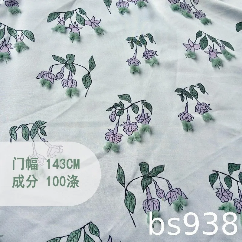 The jacquard fabric with cut flowers and purple flower buds for dress is a designer's