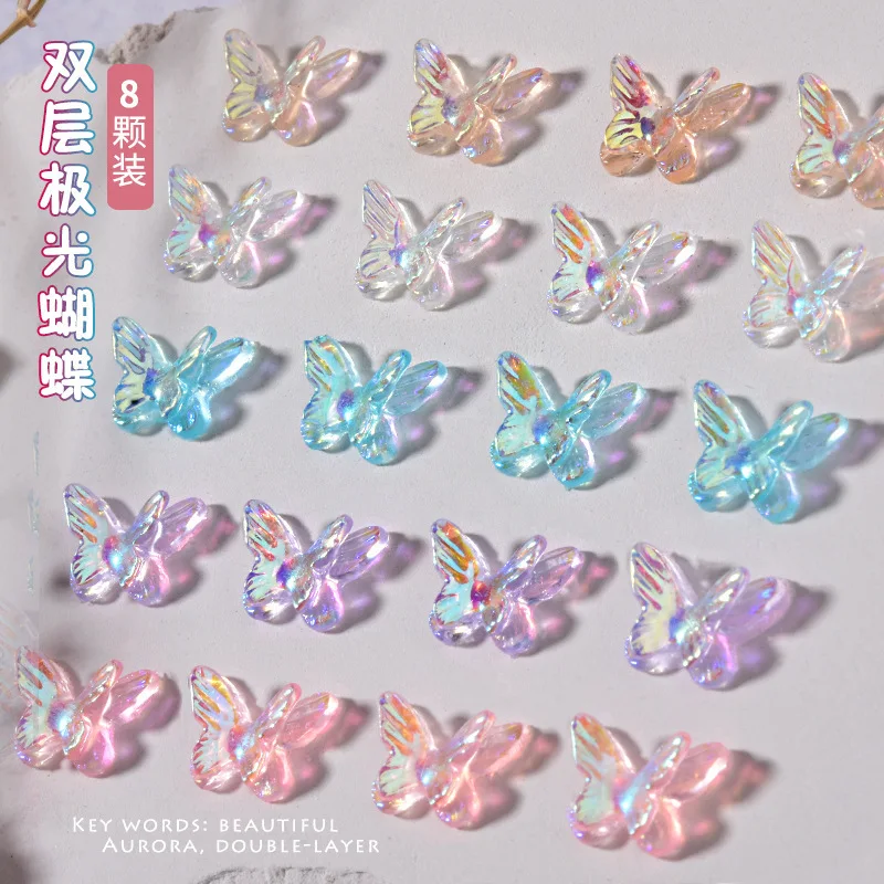 20 sztuk Aurora kolorowe podwójne skrzydła motyl Nail Art Charms 3D 11*8mm motylkowe akcesoria do dekoracji paznokci DIY Kawaii figurki do paznokci