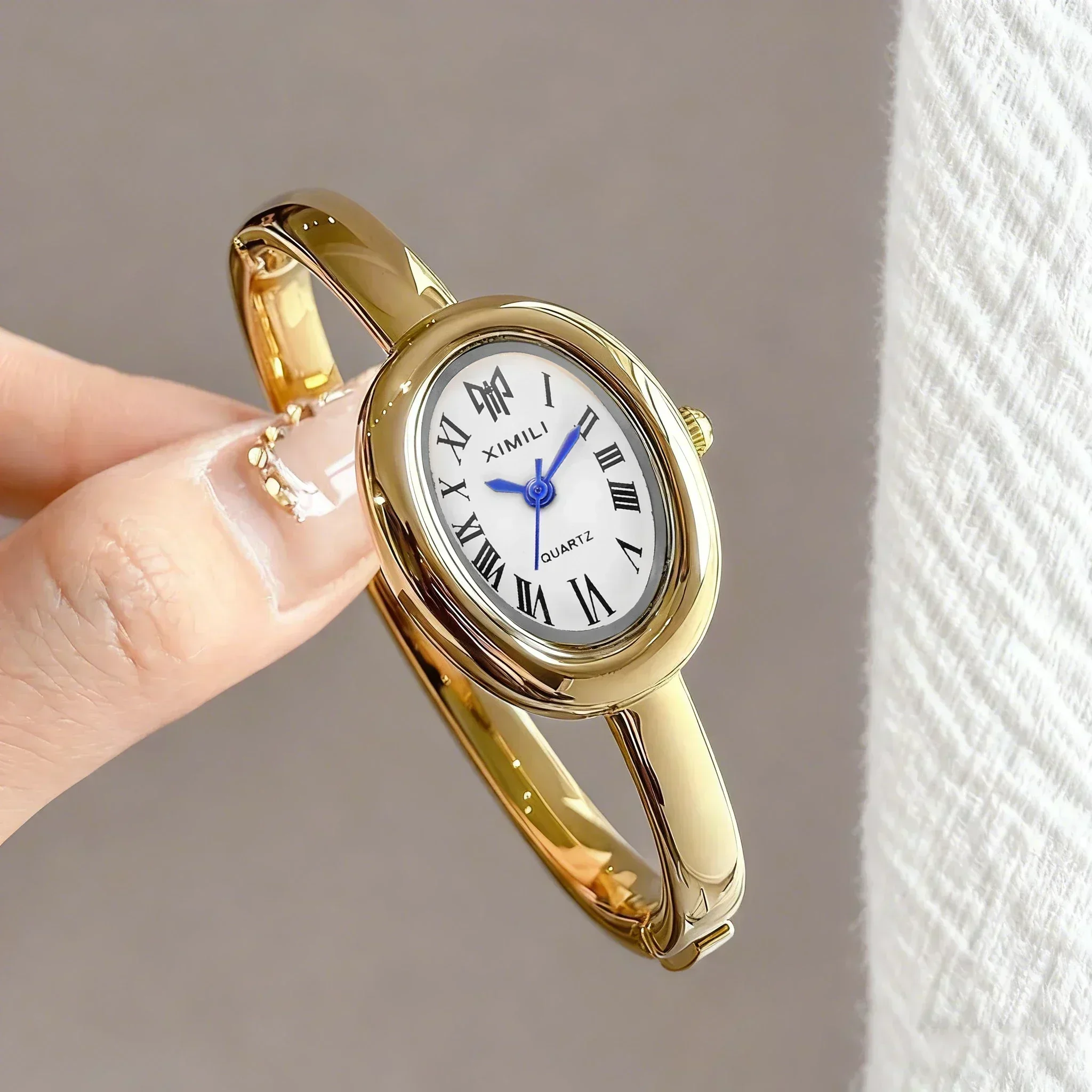 Fashion Ladies Elegant Oval Quartz Wristwatch Gold Open Bangle Bracelet Watch For Daily Wear