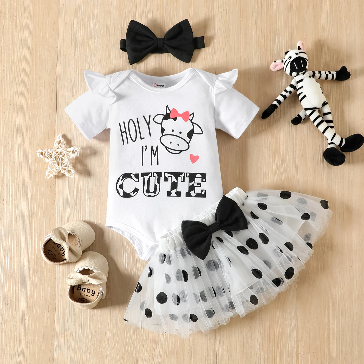 

PatPat 3pcs Baby Girl 95% Cotton Ruffle Short-sleeve Letter & Cow Print Romper and Polka Dots Mesh Skirt & Headband Set