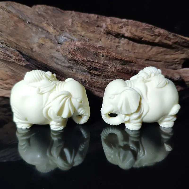 

Ivory Fruit Handheld Piece Elephant Carving Animal Rich and Lucky Ornaments Car Ornaments Fortune Elephant Crafts Decorations