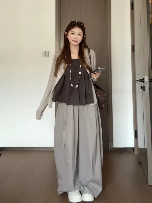 

Женский корейский комплект из двух предметов больших размеров: тонкий кардиган и жилет на бретельках для ранней осени, с эффектом омоложения