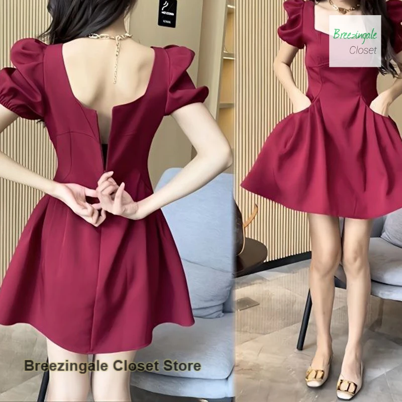 

Summer temperament square collar bubble sleeve dress female French design sense pleated waist slim A-word casual fluffy skirt