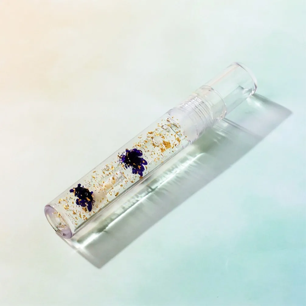 Huile à lèvres vegan à la fleur de marguerite, brillant transparent hydratant pour les lèvres sèches, marque privée, logo personnalisé, maquillage en gros, nourrit les lèvres, cosmétiques