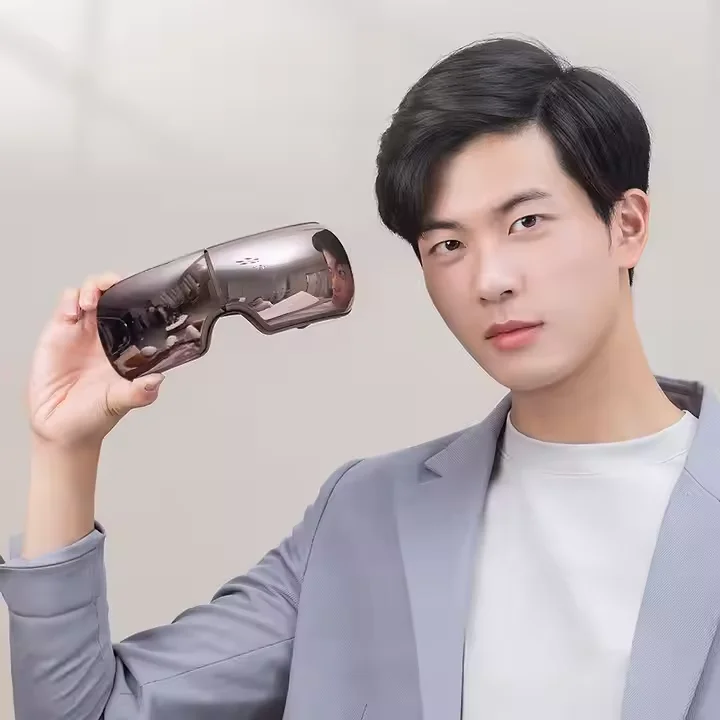 Massaggiatore per occhi intelligente con pressione dell'aria, vibrazione del calore e musica per alleviare la tensione degli occhi e rilassamento del viso Maschera per gli occhi digitale