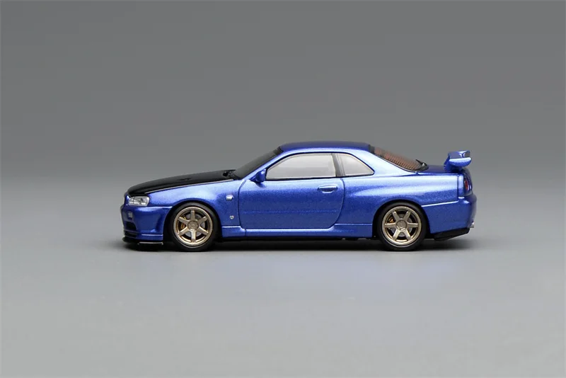 

Масштабная модель автомобиля 1:64 SKYLINE (R34) V-SPEC II CUSTOMIZED BAYSIDE BLUE, коллекционная, литая под давлением