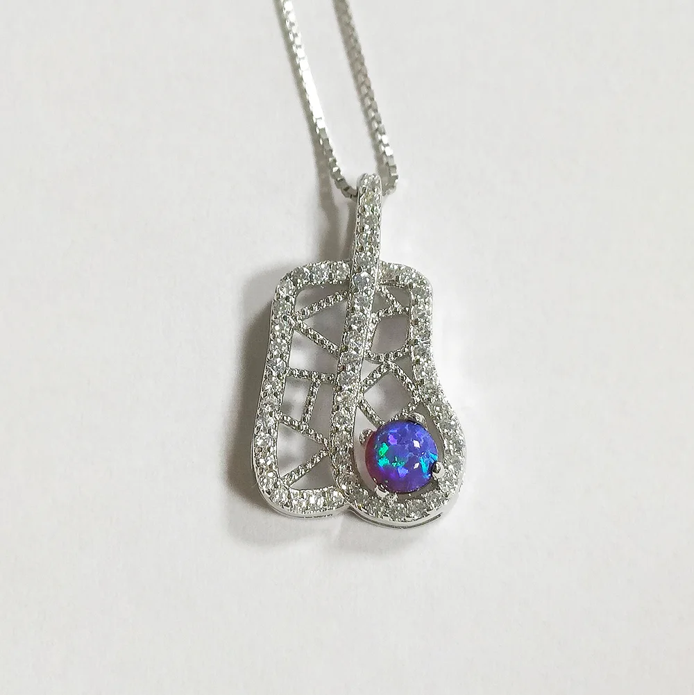 

Nature Inspired Banana Leaf Pendant for Men Women Sterling Silver Fire Opal Pendant