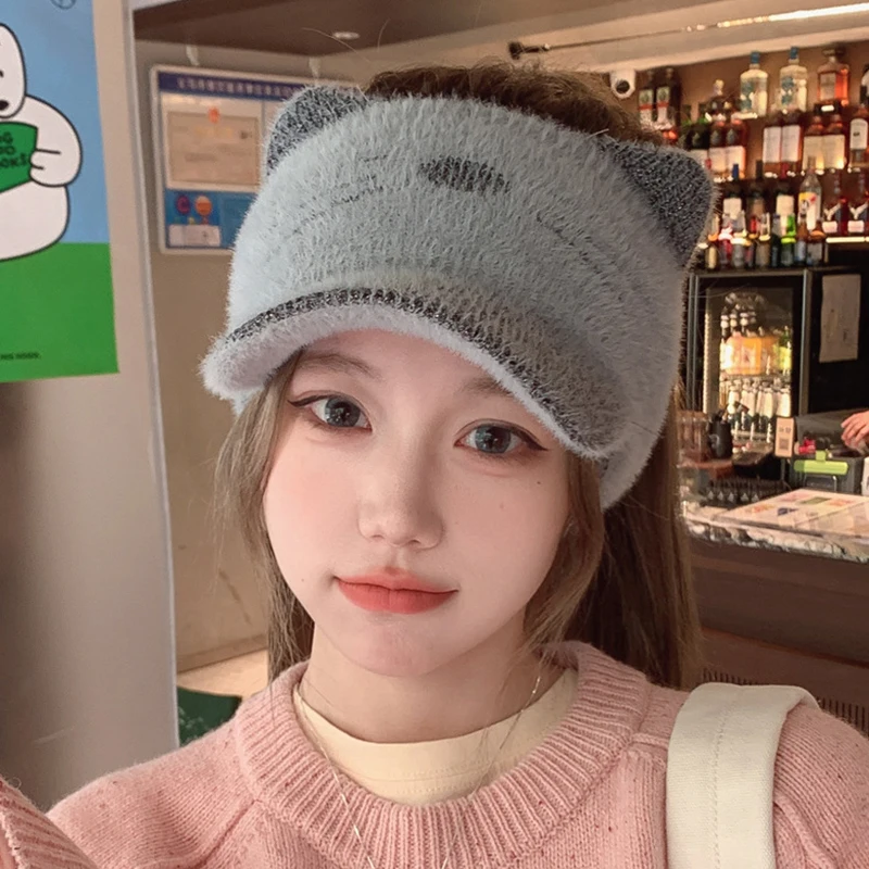 Autumn and winter knitted wool cap Warm plush hollow cap Cat-shaped wool cap Women\'s duck tongue cap Knitted ponytail cap